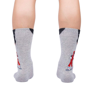 Rear view of the 'Moon Walk in the Morning' socks on a person's legs, showcasing the back design.