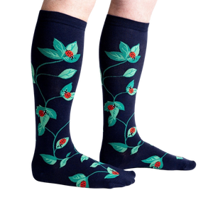 Lifestyle shot showing the socks on a person's legs, showcasing fit and style.