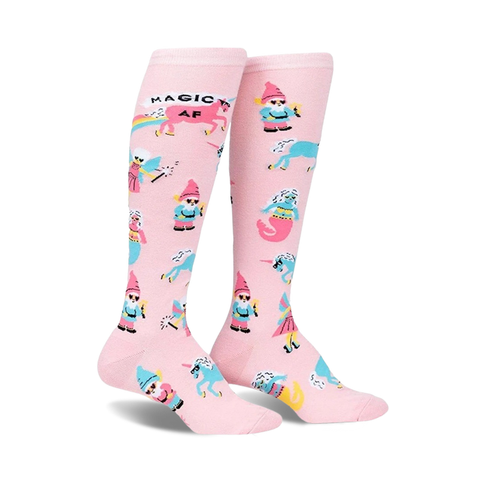 Pair of pink knee-high socks with gnomes, unicorns, mermaids, and rainbows. Features 'Magic AF' text. }}