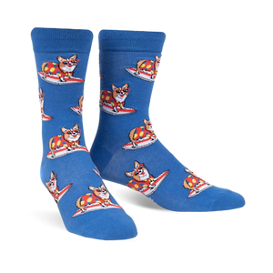 Pair of blue crew socks with repeating pattern of corgis wearing colorful shirts and surfing.