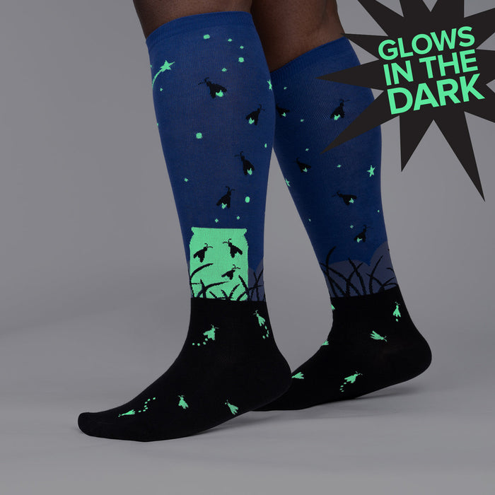 Close-up view of the Nightlight socks showcasing the detail of the firefly and jar design.