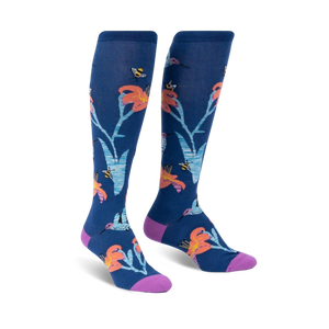 blue knee-high socks with pattern of hummingbirds, bees, and flowers.  