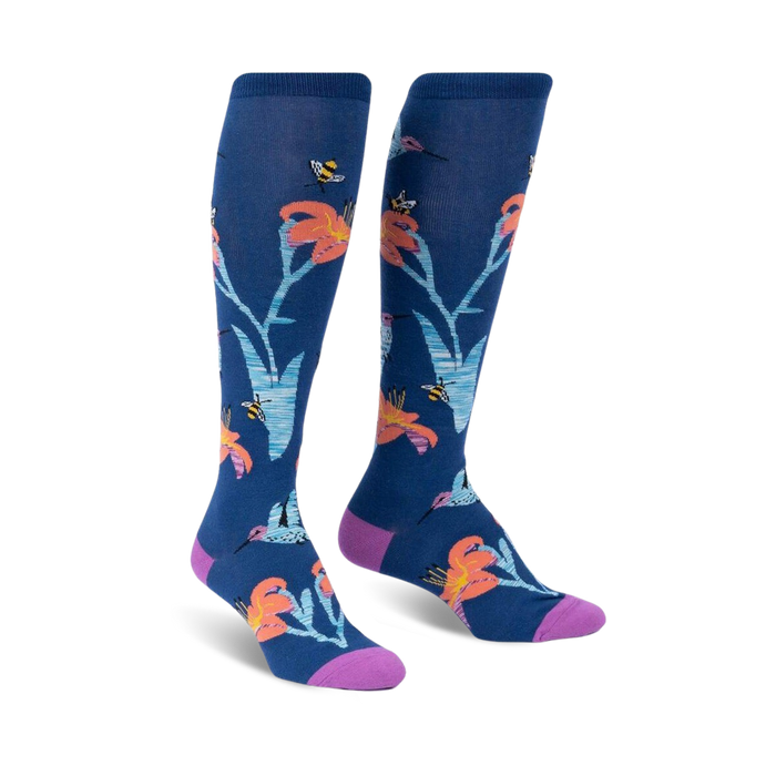 blue knee-high socks with pattern of hummingbirds, bees, and flowers.  