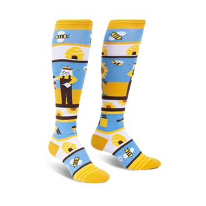 Pair of women's knee-high socks. Yellow, white, and blue stripes with bee, sunflower, and honey pot designs.