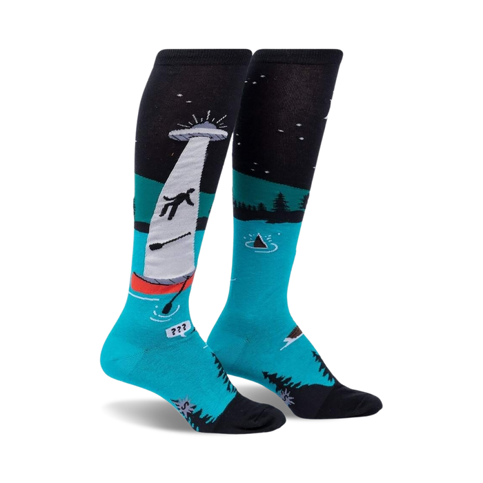 black and blue knee-high socks with abduction pattern, glow-in-dark feature; women's.  