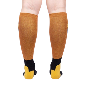 Rear view of the Crowned Crane Shimmer knee-high socks on a model's legs.