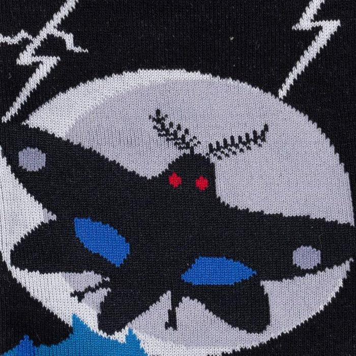 Close-up detail shot focusing on the Mothman's face and the intricate design on the sock.