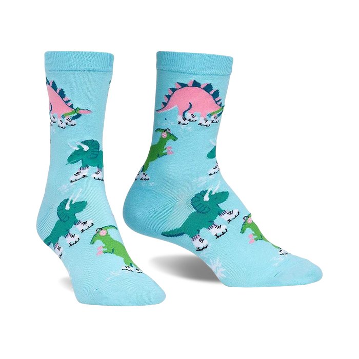Pair of light blue crew socks with ice-skating dinosaurs in pink, green, and teal. A fun, whimsical design! }}