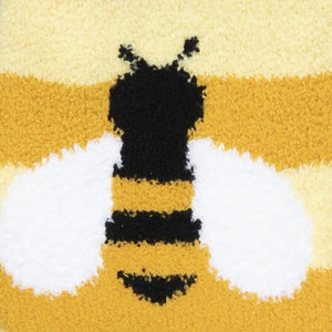 Close-up detail shot of the embroidered bee on the Bee Cozy Slipper Socks.