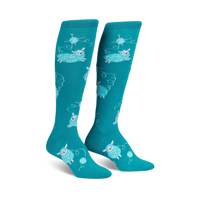knee high womens blue socks adorned with white partying sheep.  }}
