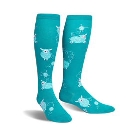 women's knee-high socks in blue featuring sheep wearing yarn scarves and rosy cheeks.  