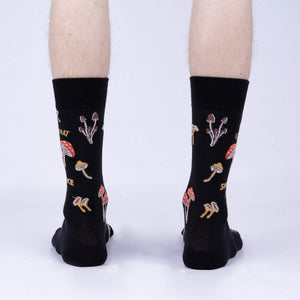 A pair of black socks with a pattern of different types of mushrooms.