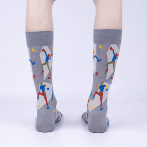 Rear view of a pair of gray Sock Climbing socks on a person's legs, highlighting the sock's full design.