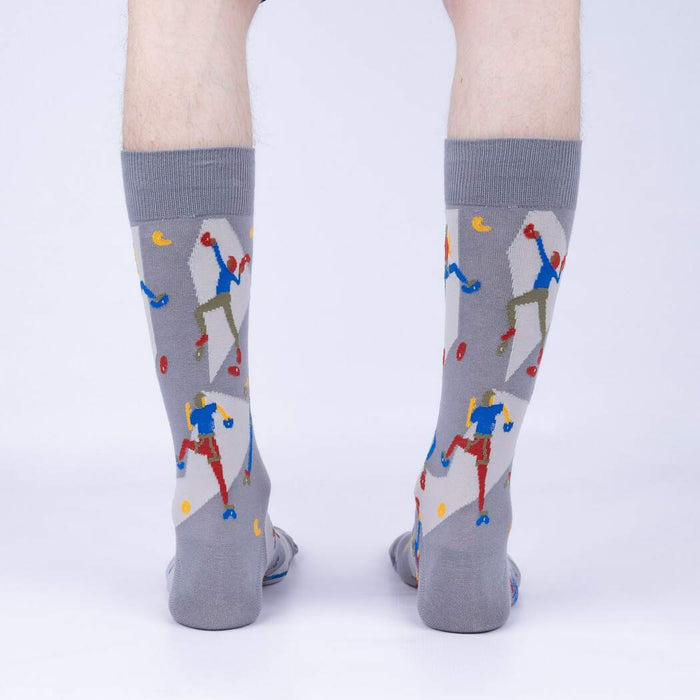 Rear view of a pair of gray Sock Climbing socks on a person's legs, highlighting the sock's full design.