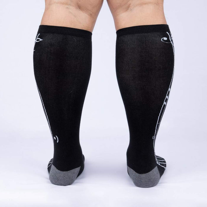 Rear view of the 'Music Is My Forte' knee-high socks, showcasing the design from the back.