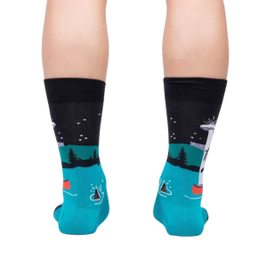 Rear view of the socks on a model's legs; showing the back design details.