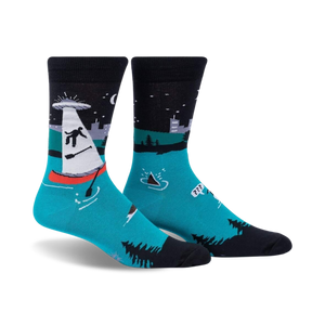 Pair of crew socks; teal, black, and white; features an illustration of a sailboat being abducted by a UFO at night.