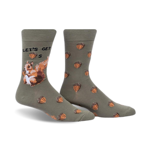 Crew socks in olive green with acorns and a squirrel design.  The text 'Let's Get Nuts' is featured on the sock.