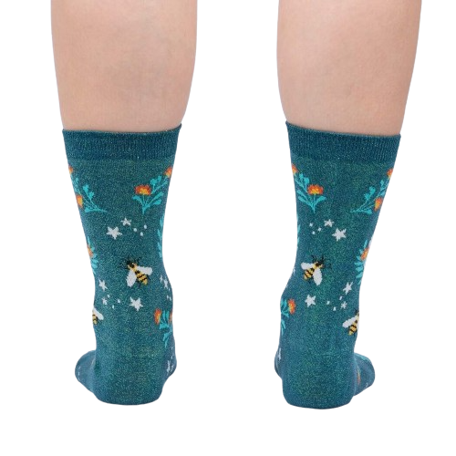 Rear view of the socks on a person's legs, displaying the design from the back.