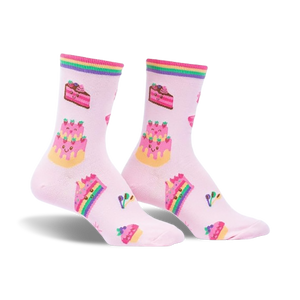 Pair of pink crew socks with rainbow stripes and whimsical cake and cupcake designs.