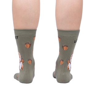Rear view of a person wearing a pair of 'Let's Get Nuts' socks, showcasing the full back design of the socks.