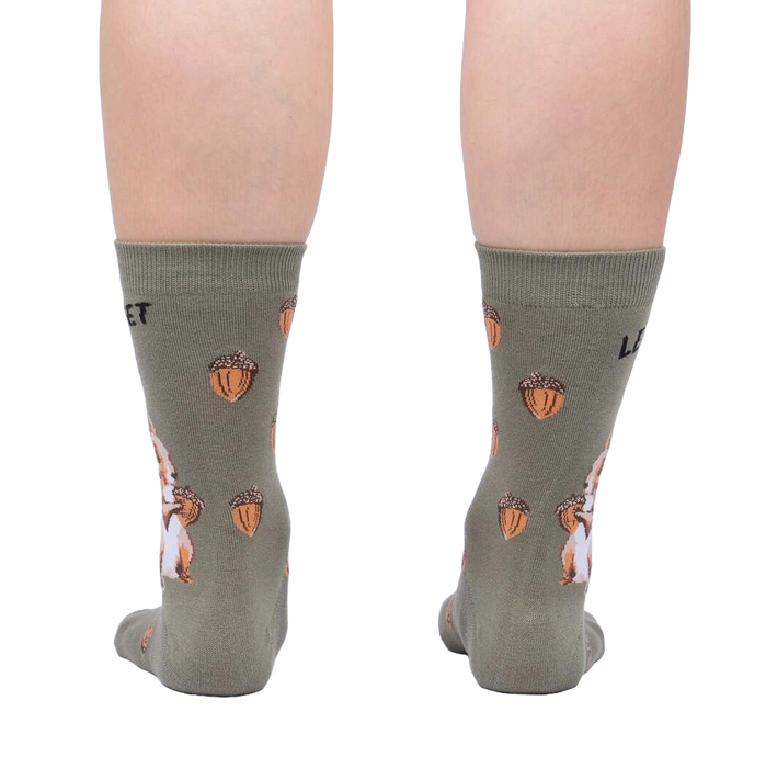 Rear view of a person wearing a pair of 'Let's Get Nuts' socks, showcasing the full back design of the socks.