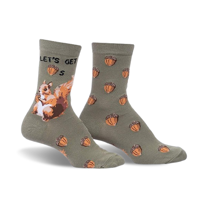 Crew socks in olive green with a playful squirrel design and acorn pattern. 'Let's Get Nuts' text is partially visible.