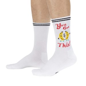 Lifestyle shot of a person wearing the 'You Got This!' socks, showcasing how they look on feet.