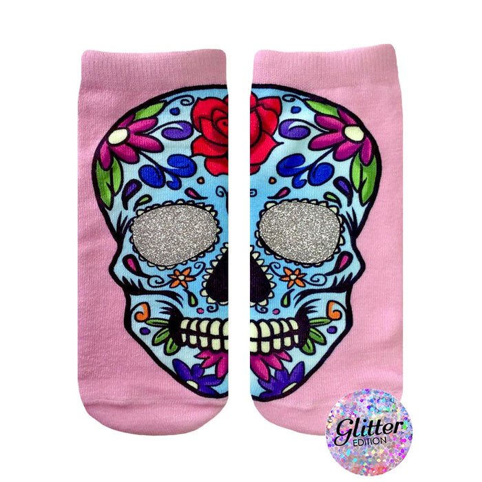 Pink ankle socks with a colorful sugar skull design. The skull's eye sockets are filled with silver glitter.  }}