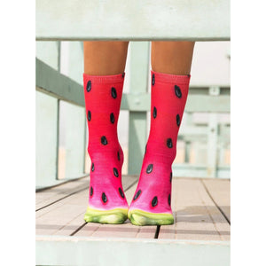 Close-up flat lay product shot of two watermelon crew socks against a white background