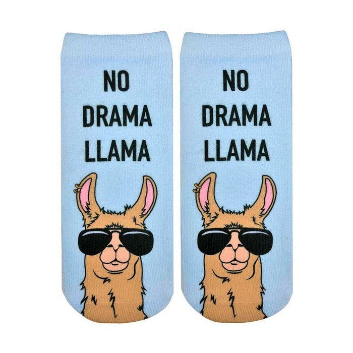 Pair of light blue ankle socks with a tan llama wearing sunglasses. Text reads,