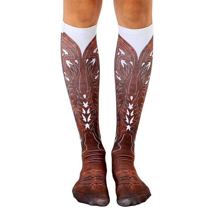 Pair of knee-high socks showcasing a brown cowboy boot design on a white background.  Detailed stitching and wear effects are visible.