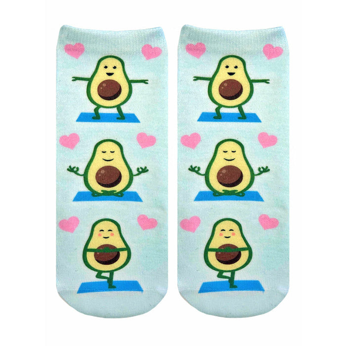 Pair of light blue ankle socks featuring repeating illustrations of cartoon avocados doing yoga poses and surrounded by pink hearts. }}