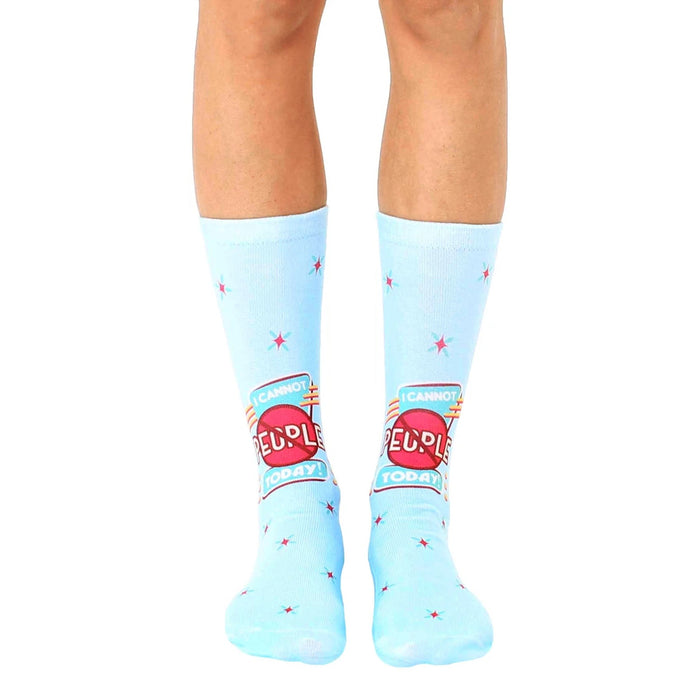 Pair of light blue crew socks featuring a retro-style graphic that says 'I Cannot People Today'.  Red and white accents and small stars.