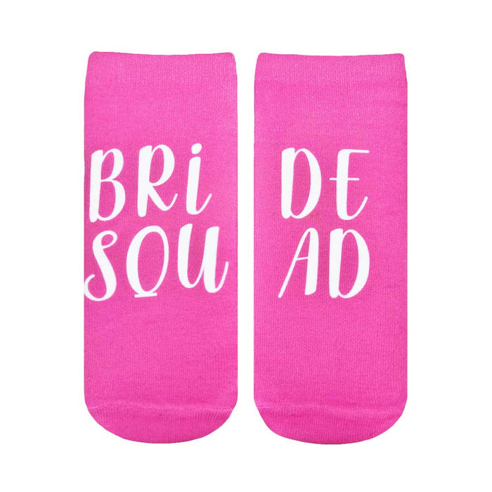 A pair of pink ankle socks with 'Bride Squad' written in white. Perfect for bridal parties! }}