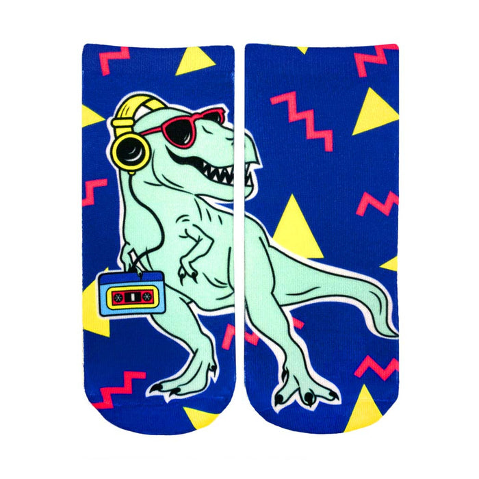 An image of a pair of blue ankle socks with a cool, teal T-Rex wearing headphones and sunglasses, holding a cassette player. The socks have a 90s-inspired geometric pattern. }}