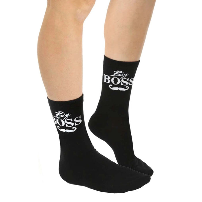 Close-up of a pair of adult 'Big Boss' socks on a model's feet.