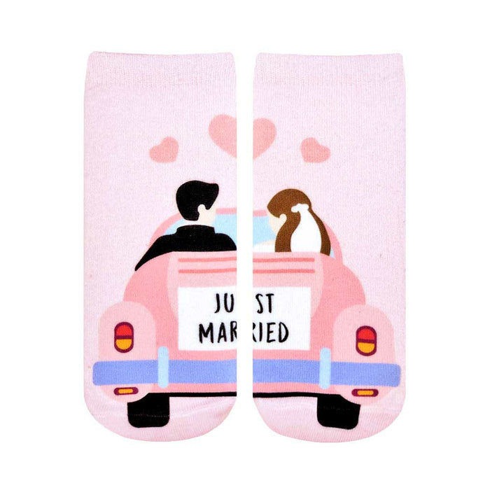 Pink ankle socks showing a cartoon bride and groom in a pink car with 'Just Married' sign. Sweet wedding-themed design. }}