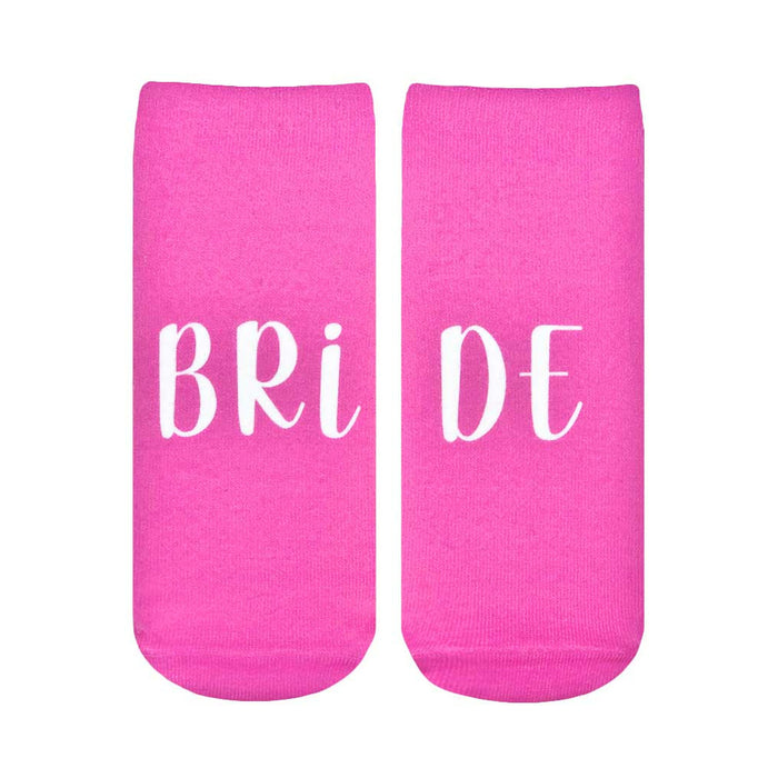 Pair of pink ankle socks with the word 'BRIDE' in white script font across the socks. }}