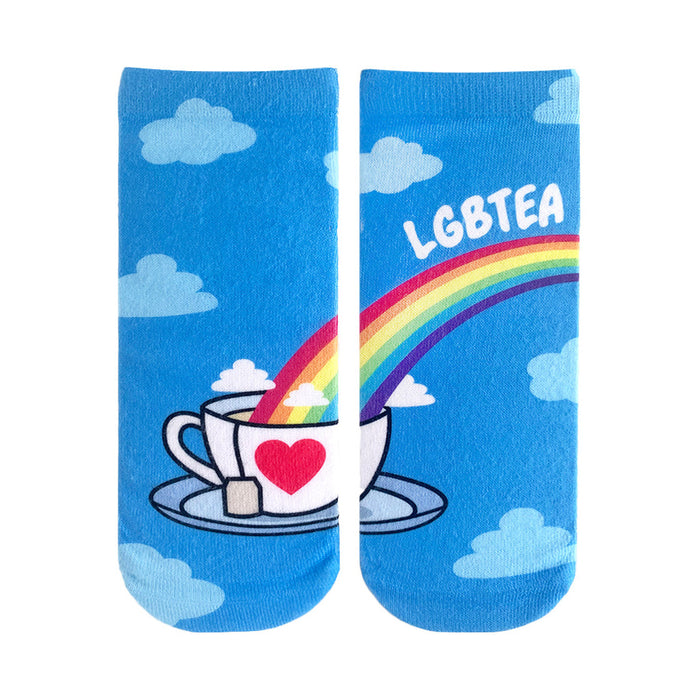 Crew socks featuring a rainbow pouring into a teacup with a heart, clouds, and 'LGBTEA' text on a light blue background. }}