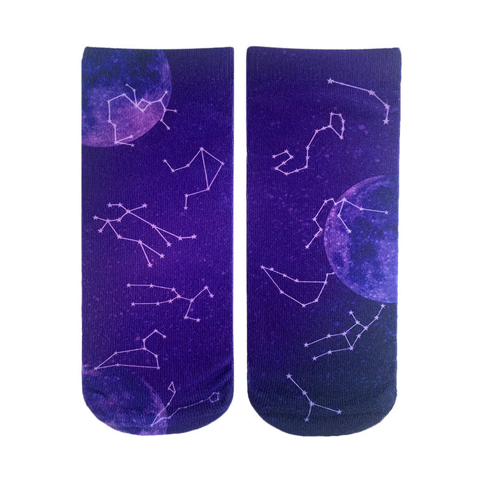 Pair of ankle socks with a dark purple background, featuring pink and white constellations and moons. }}