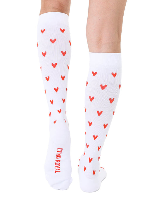 Rear view of the socks, showcasing the 'Living Royal' logo on the back in red.
