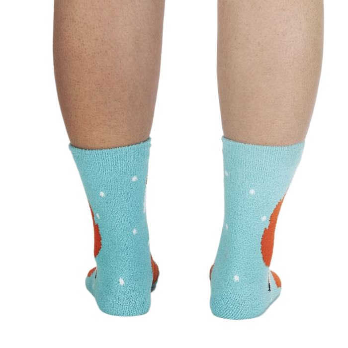 Back view of the fox slipper socks on a person's legs.