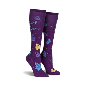 Pair of purple knee-high socks with a scattered crystal design and the text 'You're a Gem'.  Crystals are blue, yellow, and sparkle.