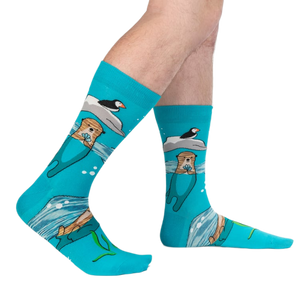 Lifestyle shot of a person's legs wearing the 'Plays Well With Otters' socks, showcasing the full design.