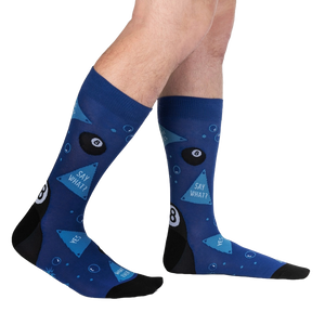 Lifestyle shot showing the socks on a person's legs, showcasing their fit and design.