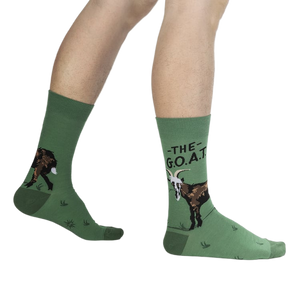 Lifestyle shot of a person wearing the green goat socks.