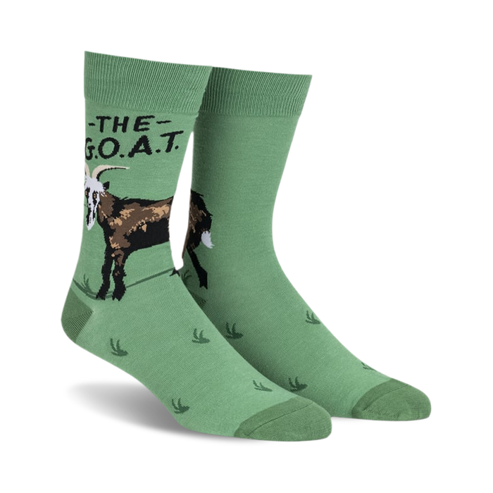 Pair of green crew socks with a brown goat graphic and 'The G.O.A.T.' text.
