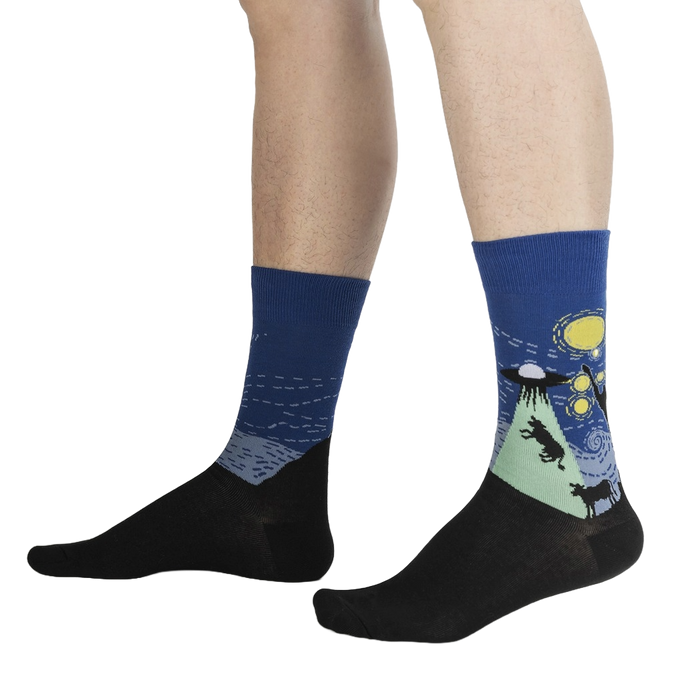 Lifestyle shot showing The Starry Flight socks on a person's legs, highlighting the fit and design.