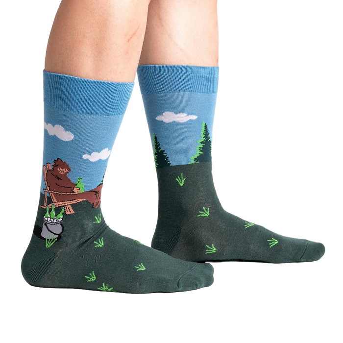 Lifestyle shot of 'Bucket List' socks on a person's legs, showing the socks' fit and design.